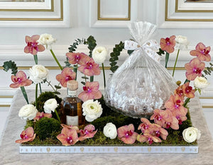 Orchids Elegant Arrangement with Bowl of Chocolates (Flower colors & type based on availability)