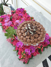 Load image into Gallery viewer, Luxury Orchids & Pink Flower Bed with Glass Bowl of Chocolates