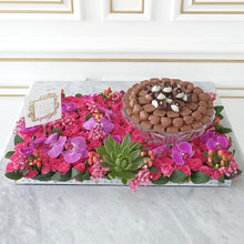 Load image into Gallery viewer, Luxury Orchids & Pink Flower Bed with Glass Bowl of Chocolates