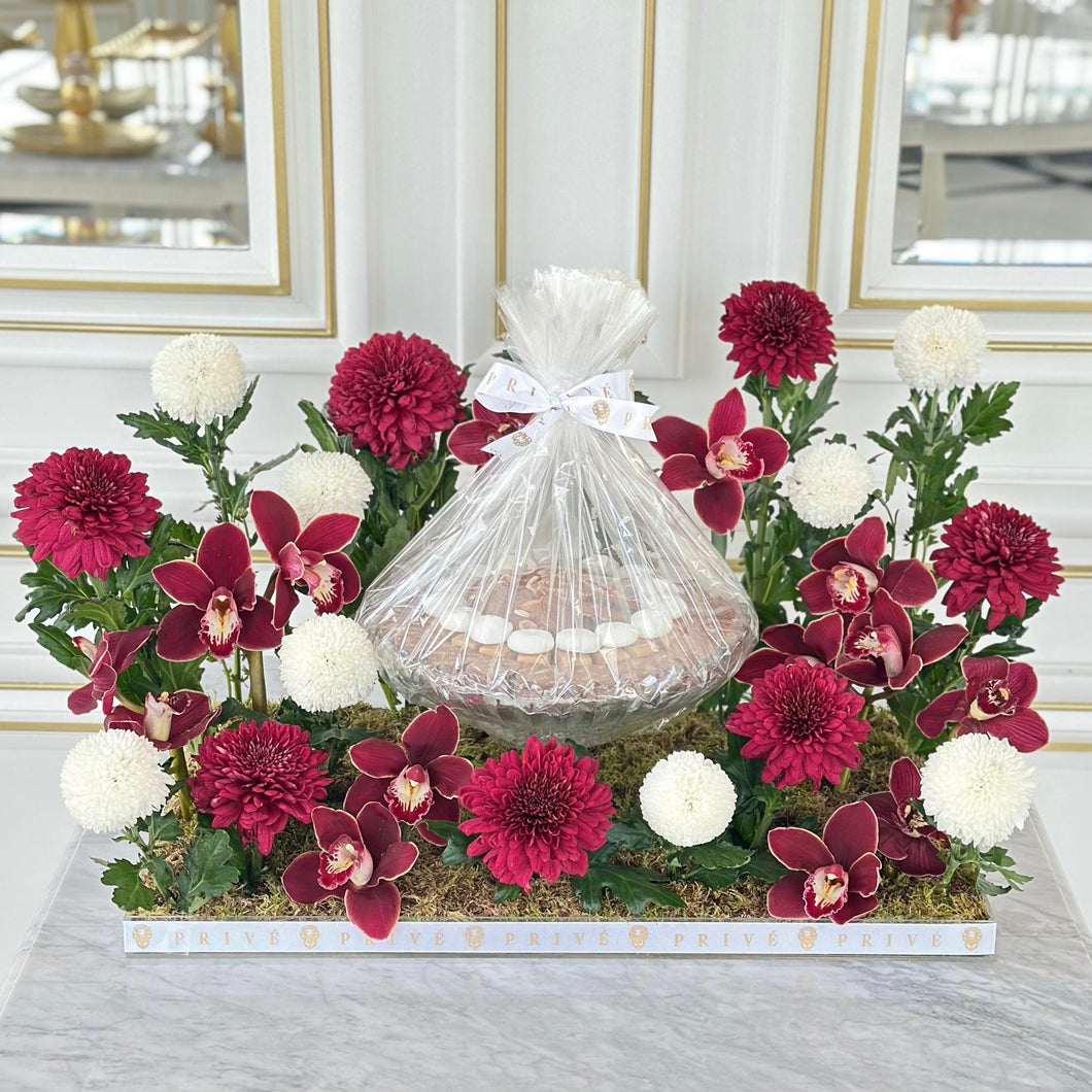 Maroon White Arrangement with Bowl of Chocolates (Flowers based on availability)
