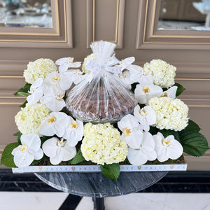 Elegant White Orchid & Hydrangeas Arrangement with Bowl of Chocolates