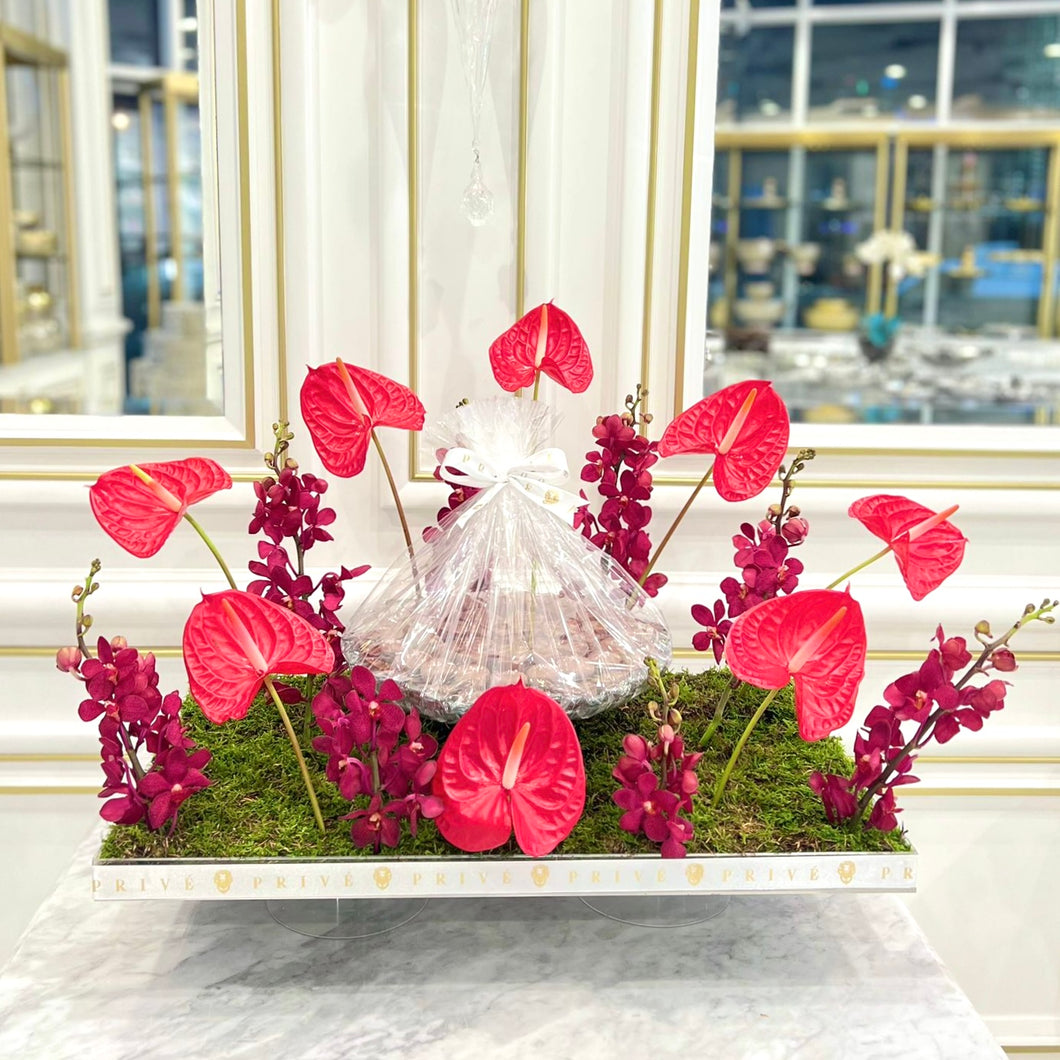Red Anthurium & Mokara Orchid Arrangement with Bowl of Chocolates
