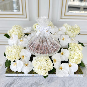 Elegant White Orchid & Hydrangeas Arrangement with Bowl of Chocolates