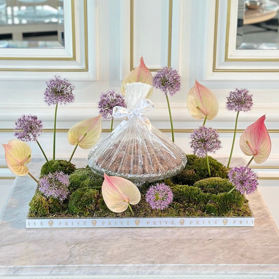 anthurium in glass Anthurium & Allium Flower Arrangement with Glass Bowl of Chocolates – Prive Chocolates