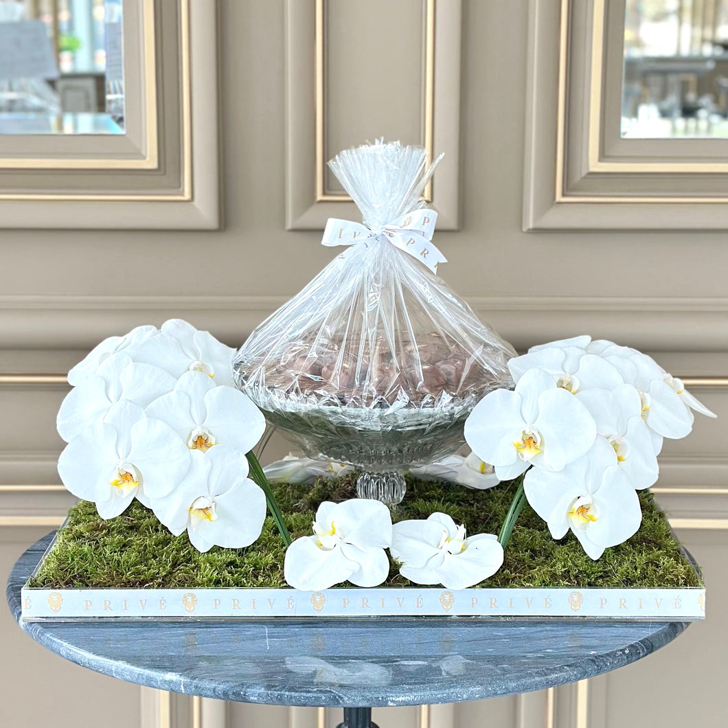 Orchid Waves White Arrangement with Bowl of Chocolates