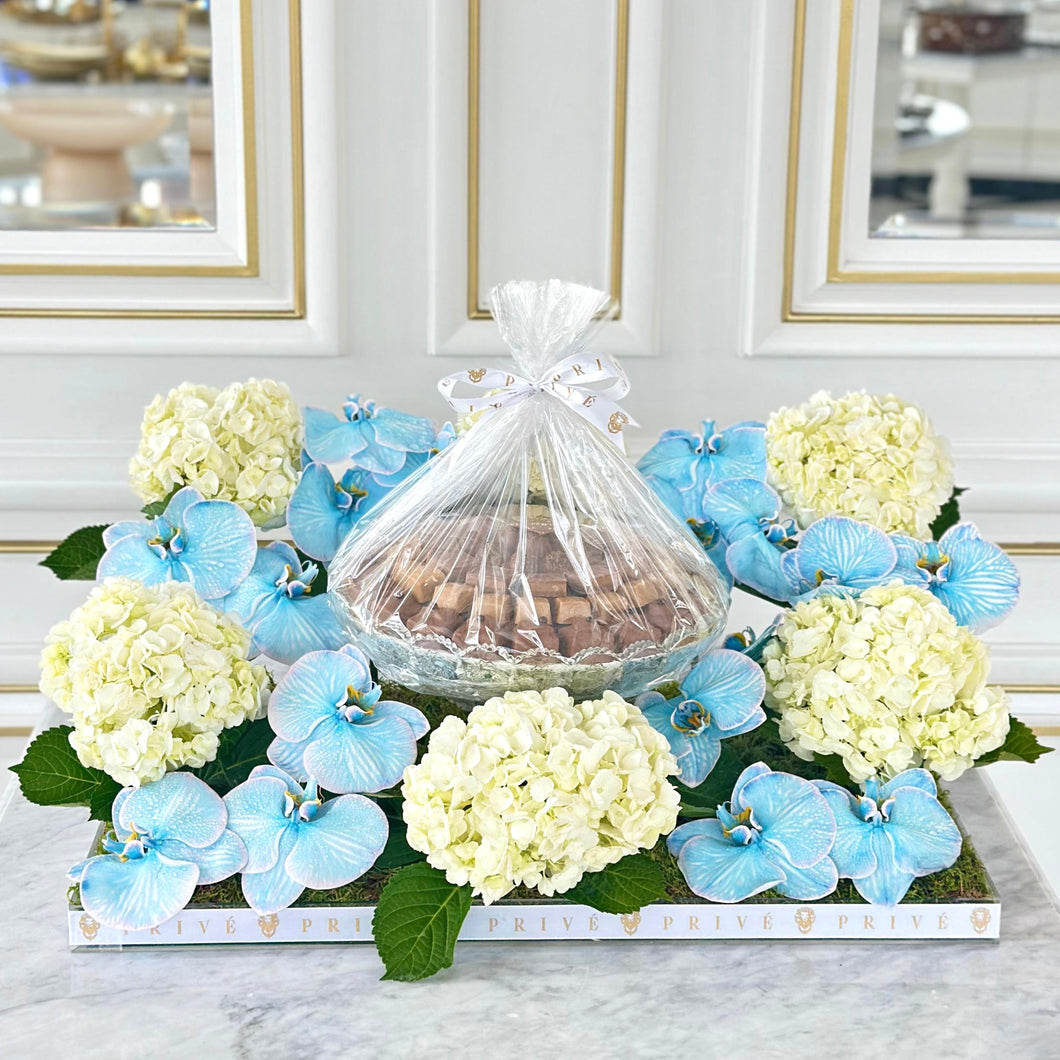 Elegant Blue Orchid & Hydrangeas Arrangement with Bowl of Chocolates