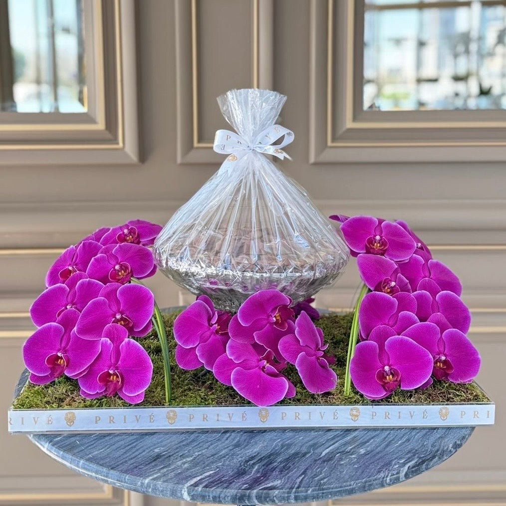 Orchid Waves Arrangement in Pink/Purple with Bowl of Chocolates