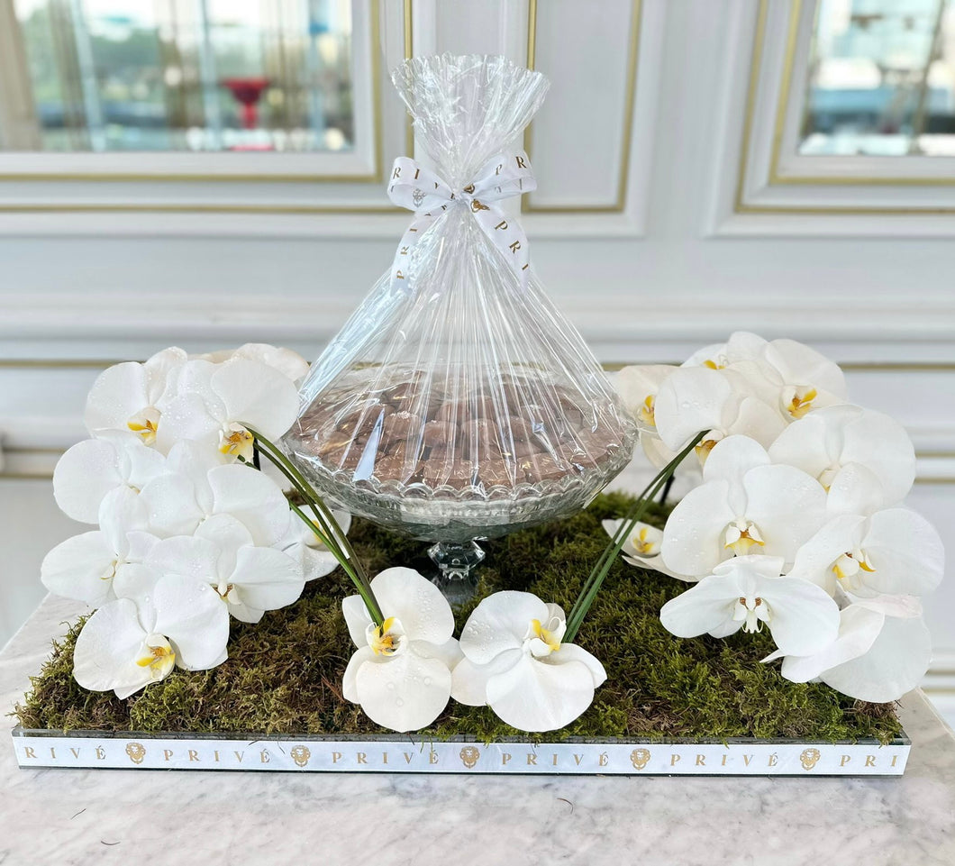 Elegant Orchid Arrangement with Bowl of Chocolates