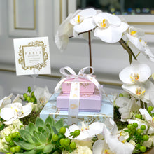 Load image into Gallery viewer, Chocolate Boxes Tower with Orchid Arrangement
