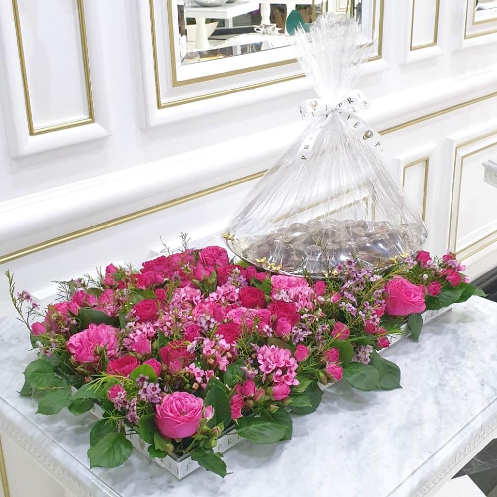Luxury Pink Flower Bed with Bowl of Chocolates