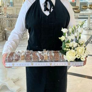 Wrapped Chocolates Gift Tray With Flowers on Side