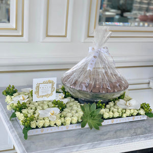 Luxury White Flower Bed with Glass Bowl of Chocolates